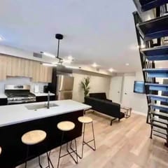 2 bedroom bi-level close to convention & city