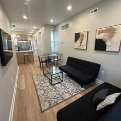 2 bedroom bi-level with back yard walk to city.
